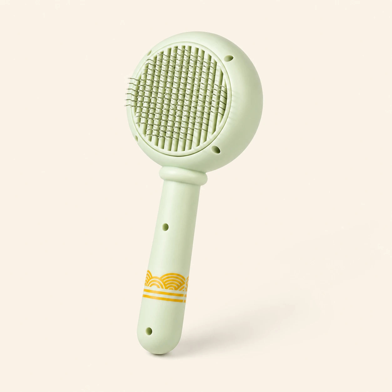 Brosse ronde verte anti-poils pour chat
