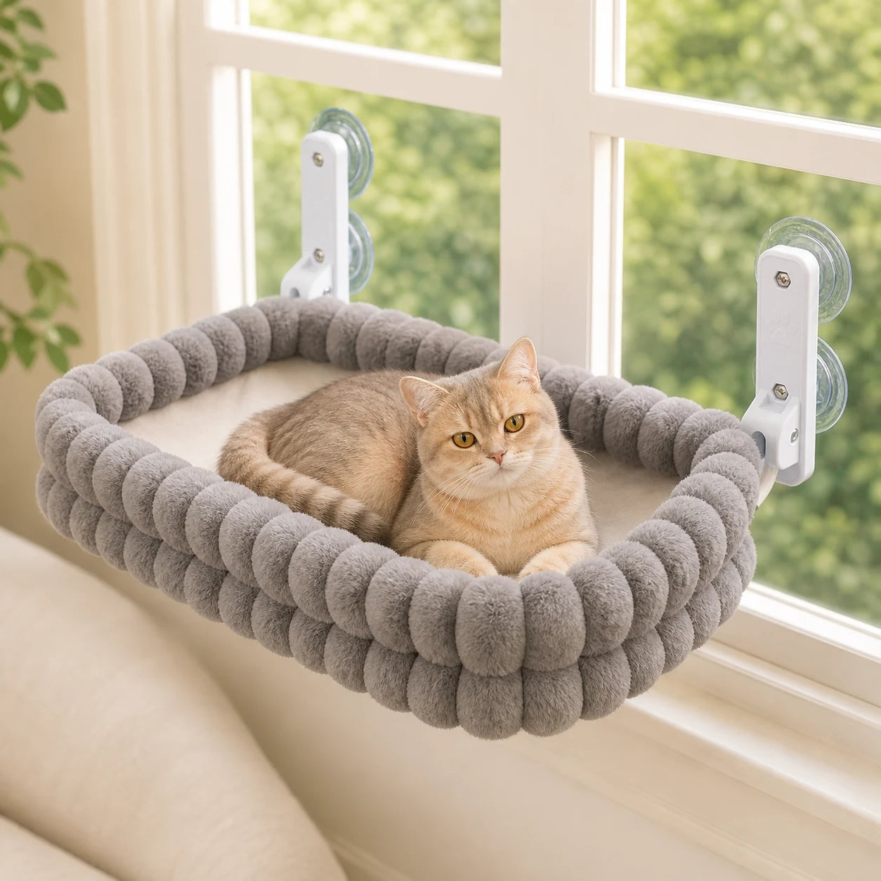 Hamac de fenêtre pour chat avec support métal utilisé par un chat