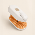Brosse vaporisante blanche pour chat