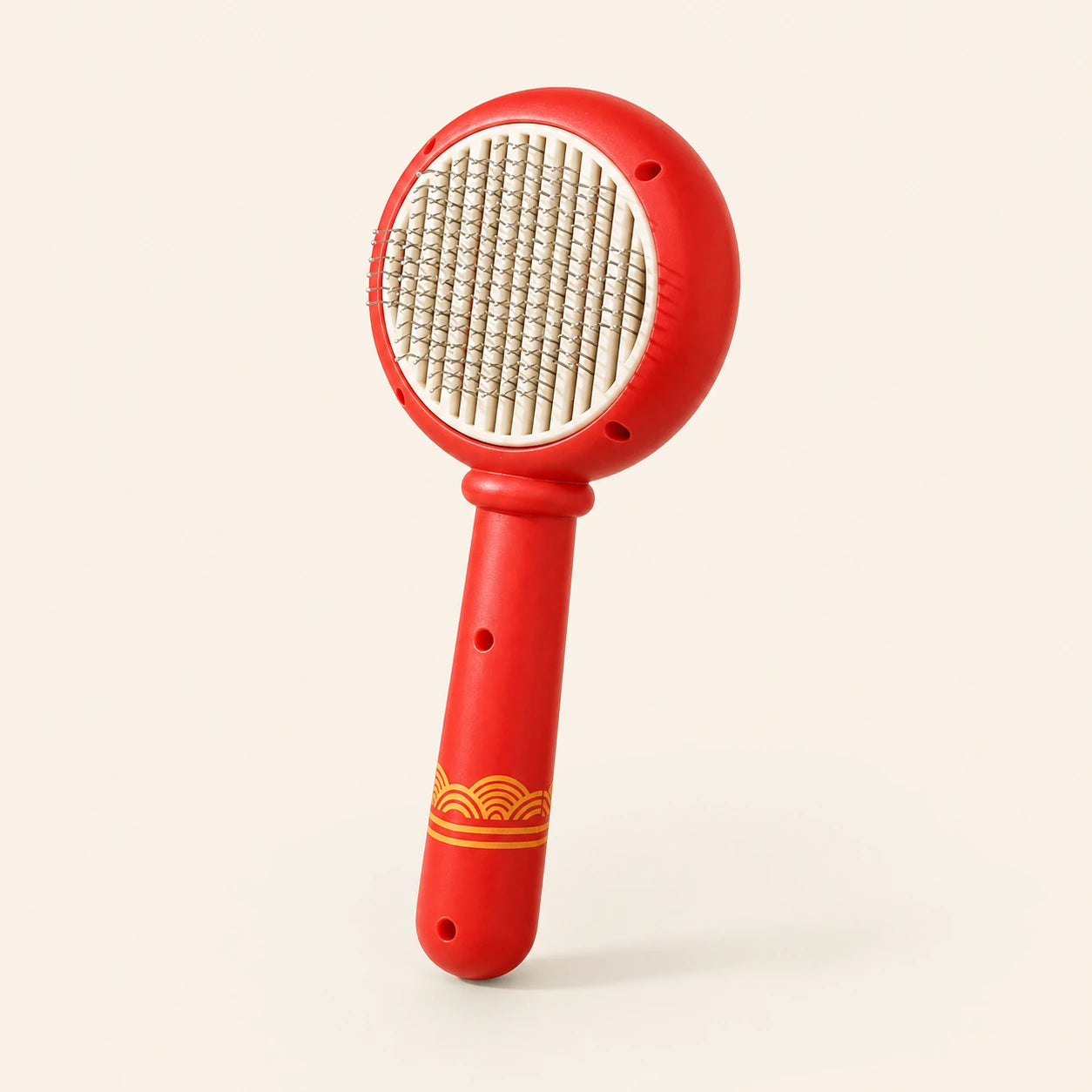 Brosse ronde rouge anti-poils pour chat